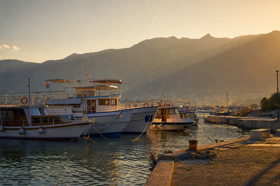 Early morning light over boats docked at Port Allen harbor on Kauai before a Na Pali cruise departure