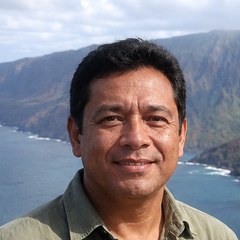 Kainoa Kealoha, Kauai tour specialist, photographed above the Na Pali Coast
